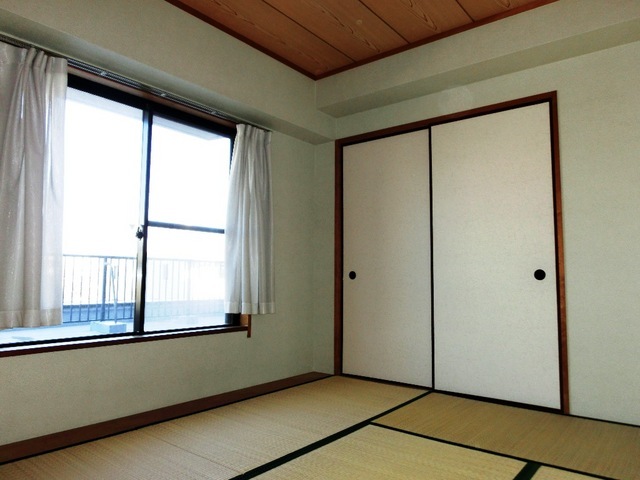 Living and room. It goes out to the roof balcony from Japanese-style room