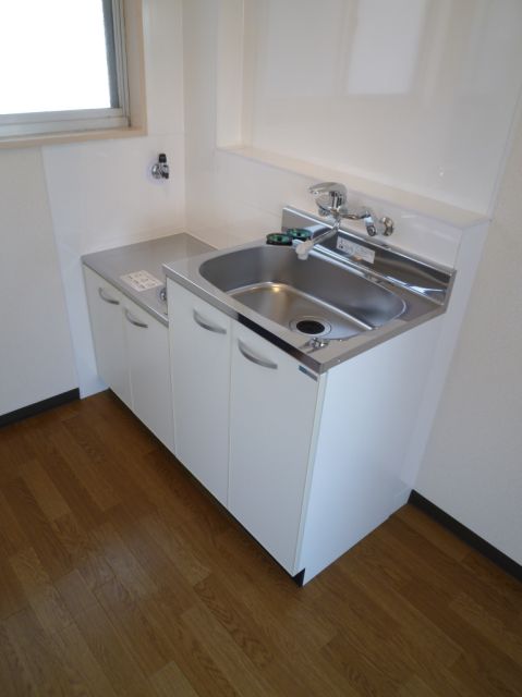 Kitchen. Two-burner gas stove is a corresponding.