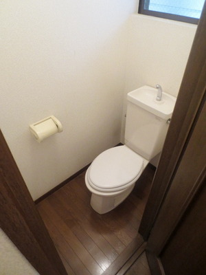 Toilet. There is a ventilation window