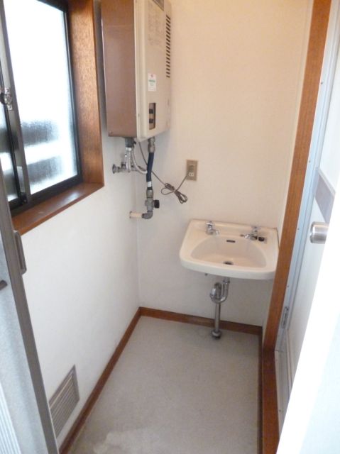 Washroom. There is also a wash basin space.