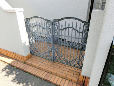 Entrance. Iron gate