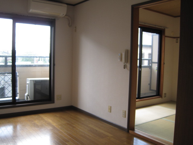 Living and room. The front is DK, The right is Japanese-style room