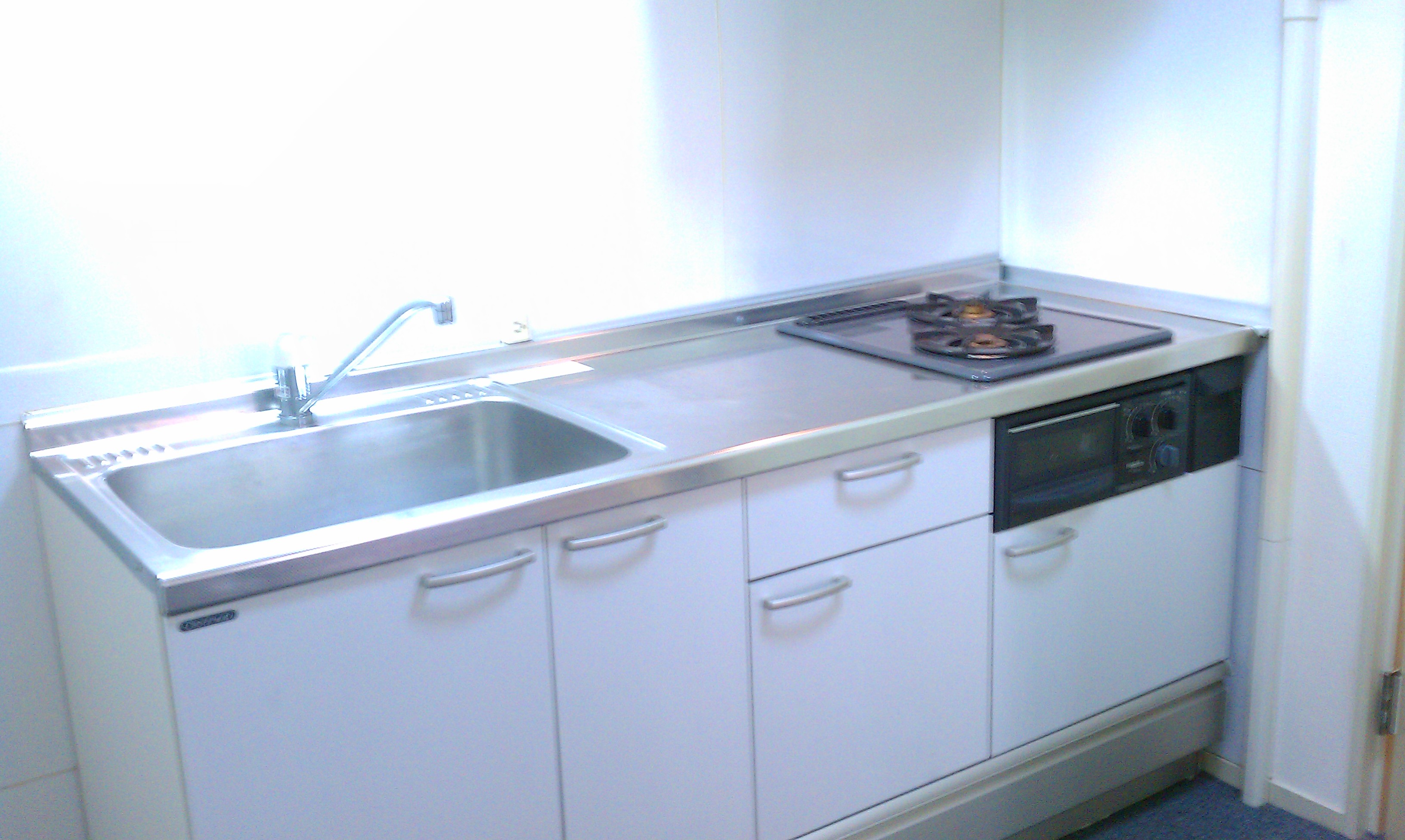 Kitchen. System is with a kitchen gas two-burner grill