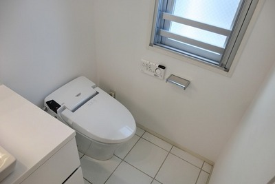 Toilet. Warm water washing toilet seat
