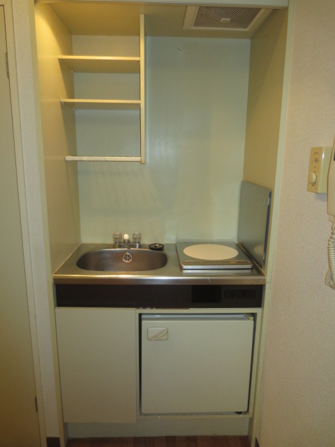 Kitchen. With mini fridge, IH heater October 2013 replaced.