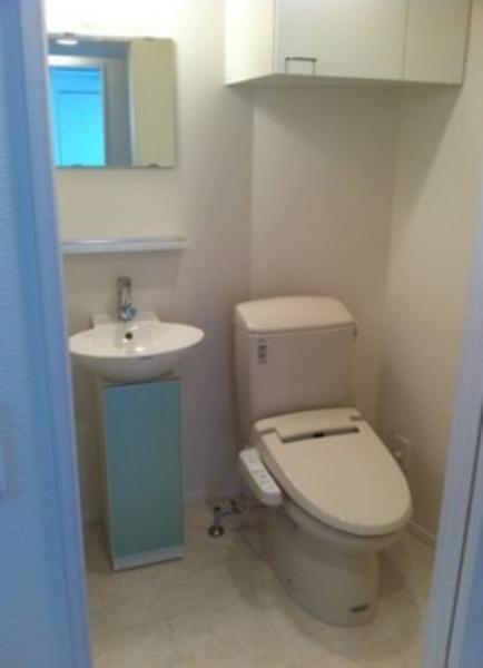 Toilet. Another dwelling unit