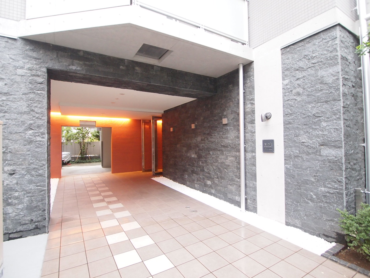 Entrance. Entrance classy surrounded by a stone stuck in the wall