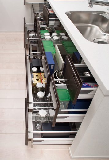 Kitchen.  [Sliding storage] Storage of system kitchens, It can be effectively utilized in the prone cabinet in a dead space, It has adopted a sliding storage. (Same specifications)