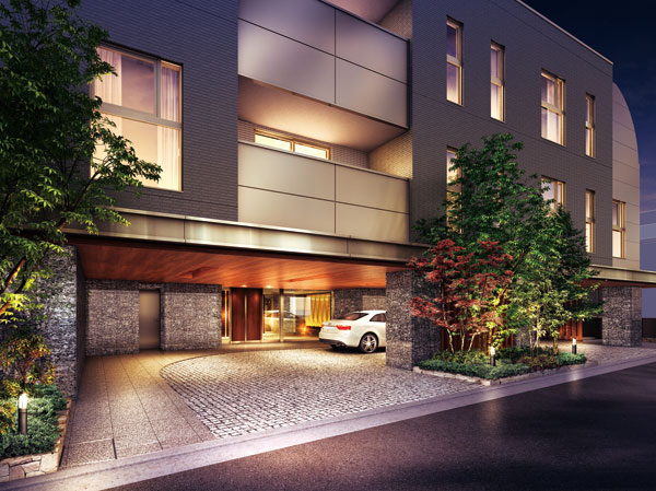Features of the building.  [Entrance Rendering] In the vicinity of the central portion of the site east arranged the planting space interwoven high-intermediate shrub, Production in symbolic as magnificent facade. The Entrance, Be getting on and off without getting wet in the rain, Set up a driveway to engrave a further style to the building. Eaves of woodgrain, Granite paste of prism and the car line has hauntingly combined heavy look.