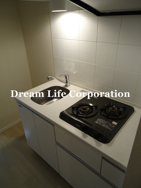 Kitchen.  ※ In fact the we use the photos in the same building may be different