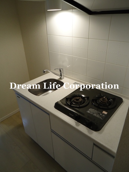 Kitchen. ※ In fact the we use the photos in the same building may be different