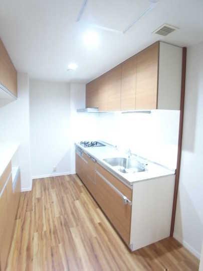 Kitchen. Storage-rich kitchen is also equipped with cupboard