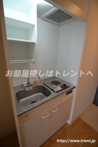 Kitchen. Is a reference photograph of the same building 1K type.