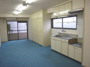 Living and room. It is a photograph of another room