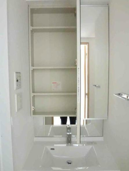 Washroom. With a three-sided mirror