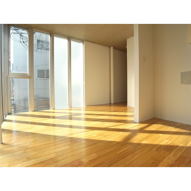 Living and room. Large floor-to-ceiling windows