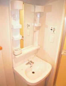 Washroom. Warm water washing toilet seat