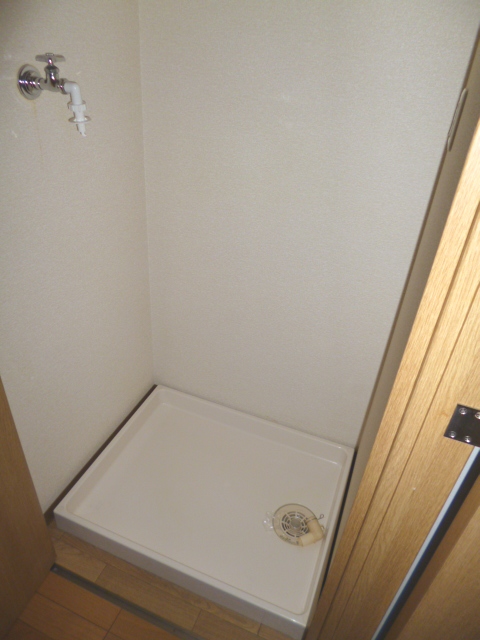 Other Equipment. Washing machine in the room