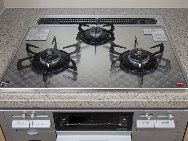 Kitchen.  [Glass top three-necked stove] Stove of strong glass top to scratches and shock. This enhancement equipment, including temperature control function of deep-fried food.