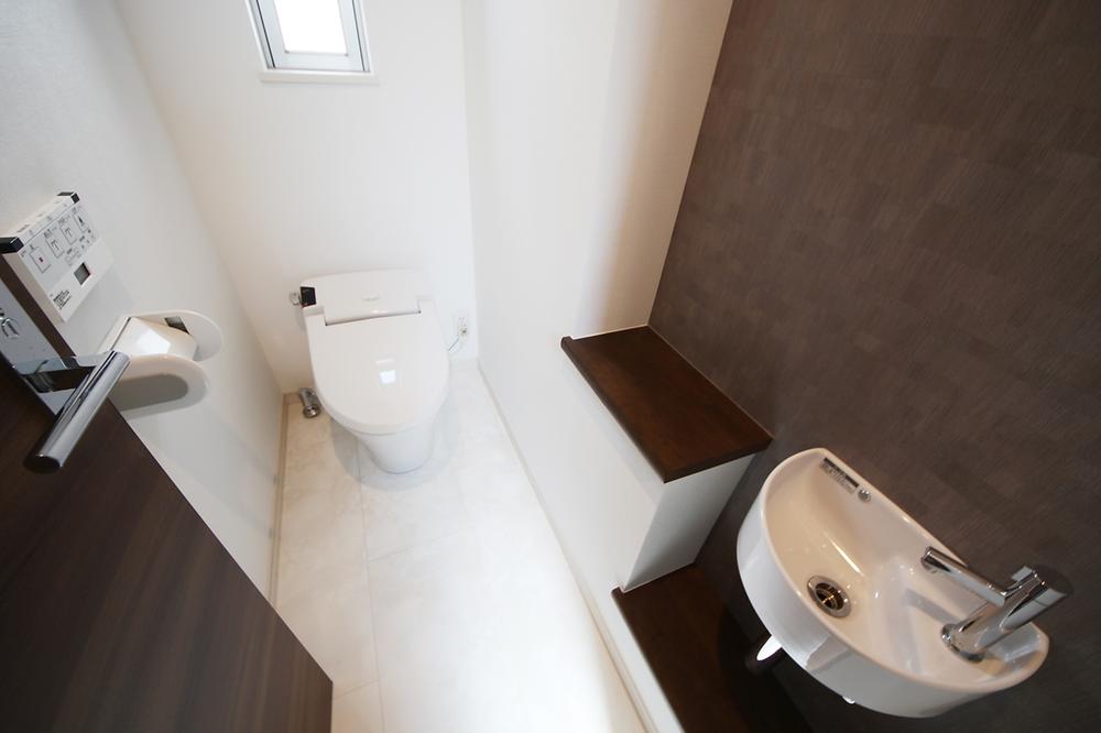 Toilet. Tankless toilet (with hand washing cabinet)