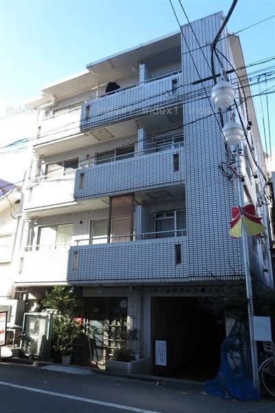 Local appearance photo. Low-rise apartment is located in a residential area