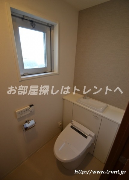 Toilet. It is a photograph of the same building (another type). Please see for reference.