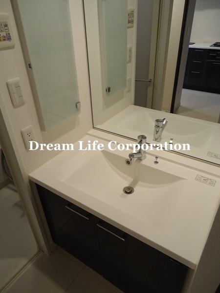 Washroom. ※ In fact the we use the photos in the same building may be different.