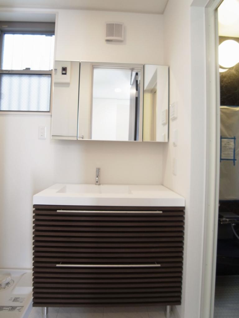Wash basin, toilet. Three-sided mirror designer basin