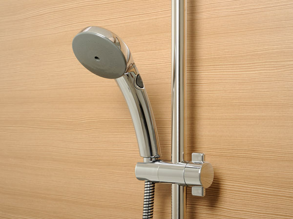 Bathing-wash room.  [Spray shower with hand switch] Has adopted a water-saving and easy to shower faucet with hand switch. It is also useful for cleaning because it operated with one hand.