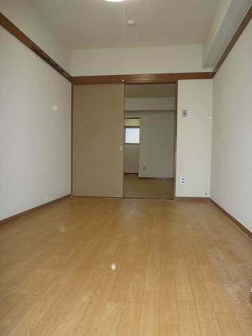 Living and room. Photograph is of the same type separate room