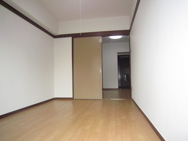 Living and room. Photograph is of the same type separate room