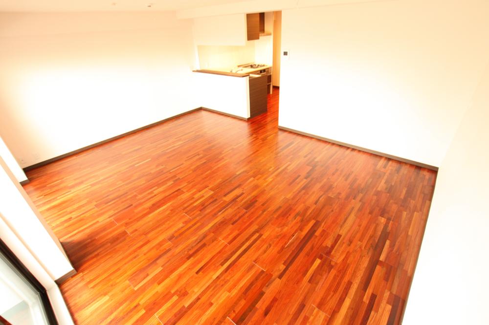 Living. Adopt a natural solid wood flooring.