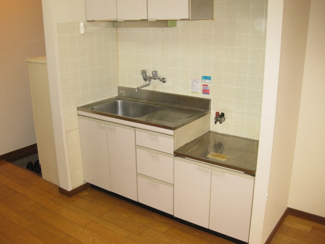 Kitchen. It puts gas stove 2-neck