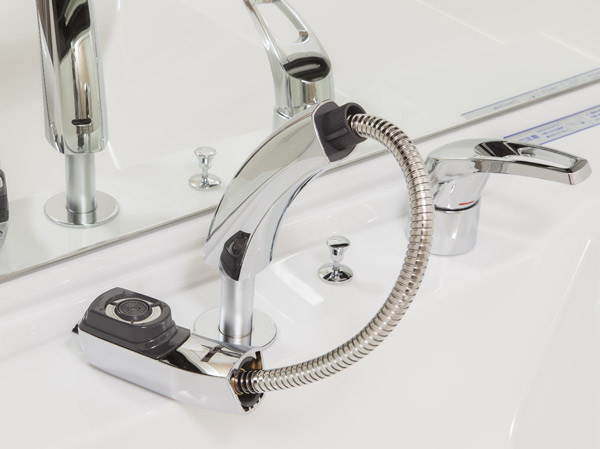 Bathing-wash room.  [Lift-up shower faucet] It has adopted the excellent lift-up shower faucet to design a metal tone. And withdraw the head part, Is a useful specification to clean the bowl since the height can be adjusted.
