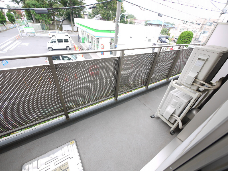 Balcony. A glance from the street on the second floor of height is not worried