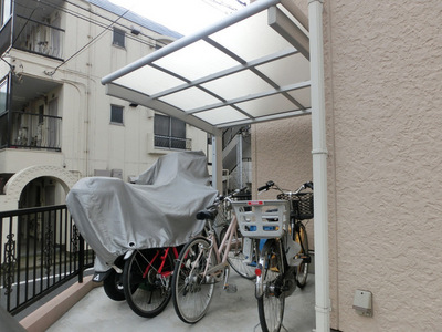 Other common areas. Bicycle parking lot with a roof