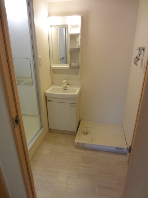 Washroom. Independent wash basin! Indoor Laundry Storage!