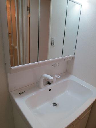 Wash basin, toilet. ~ New interior renovation completed ~