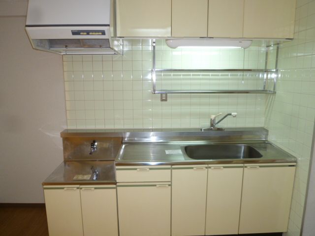 Kitchen. Two-burner gas stove can be installed kitchen