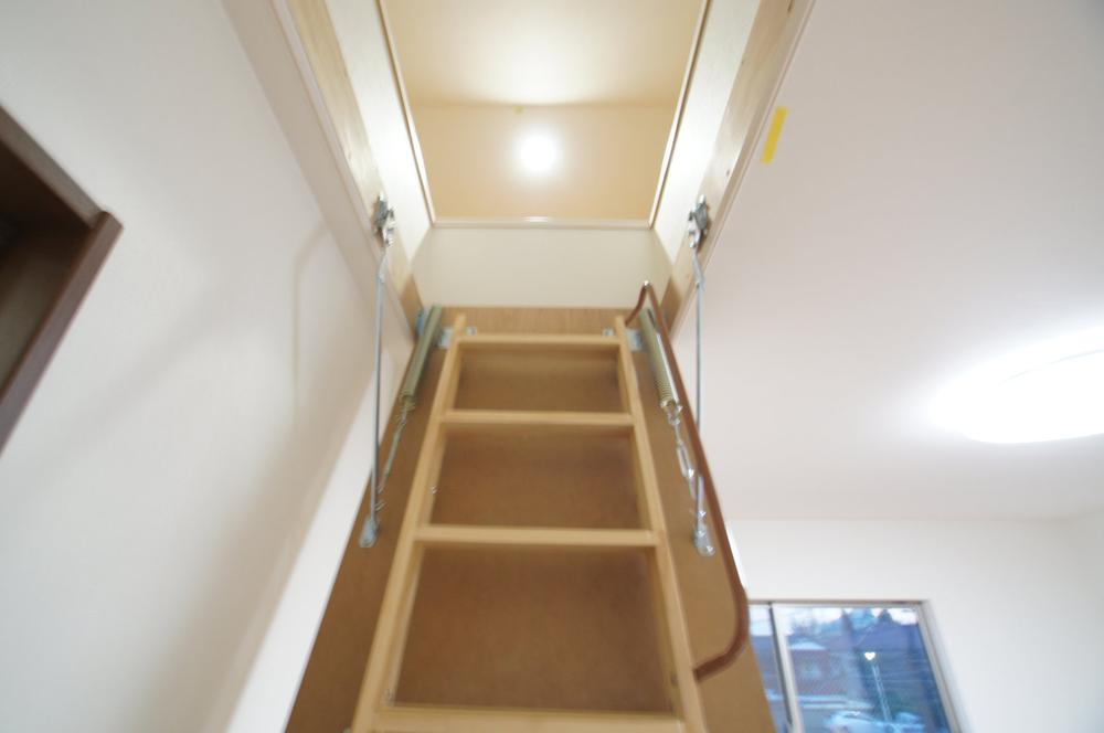 Non-living room. Is the entrance to the attic storage.