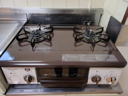 Kitchen. Stove is a new article with grill