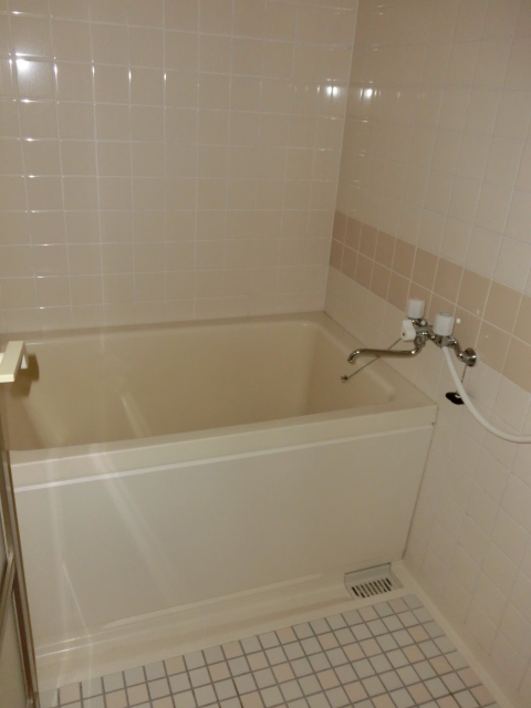 Bath. Tiled bathroom