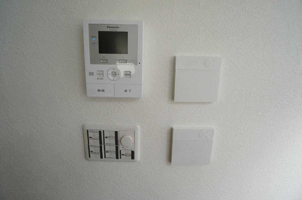 Other. Floor is evidence of heating and TV monitor with intercom. 