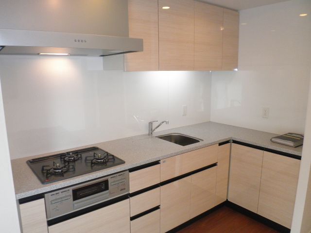 Kitchen. L is shaped kitchen.