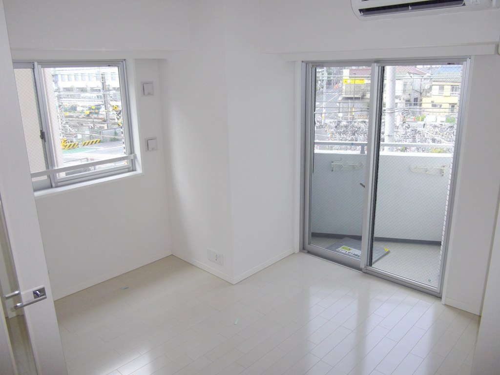 Living and room. It is a corner room.