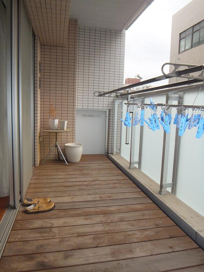 Balcony. Balcony was installed wood deck. Warm days you can use in conjunction with the living.