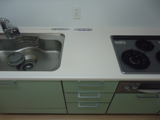 Kitchen. * It is a photograph of the 301 in Room.