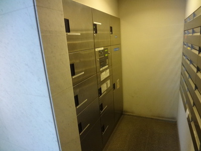 lobby. Courier with BOX