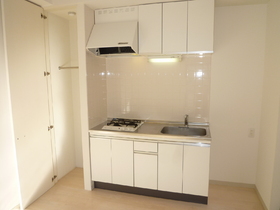 Kitchen. Two-burner gas system Kitchen ・ Storage also plenty