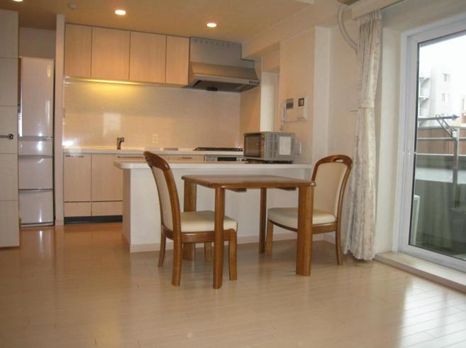 Living.  [living] The room is quiet because the balcony is not facing the street.